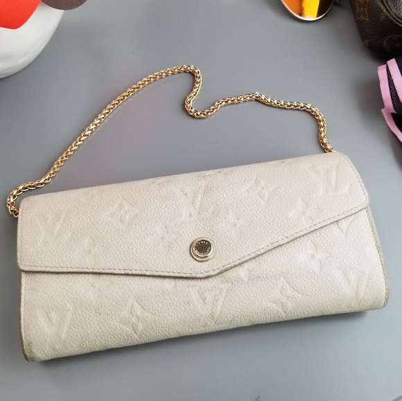 LOUIS VUITTON Portefeuille Empreinte Neige Mono - Picture 4 of 16